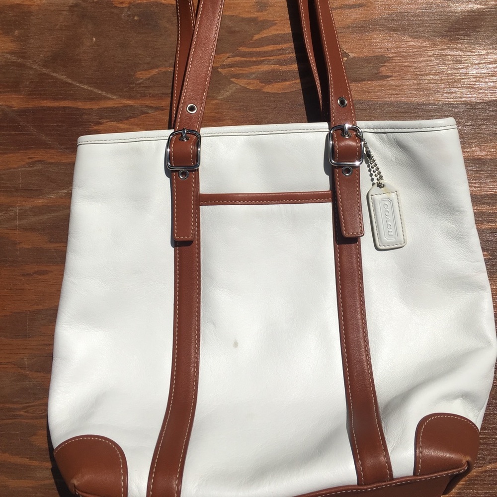 Coach handbag and wristlet set. White brown